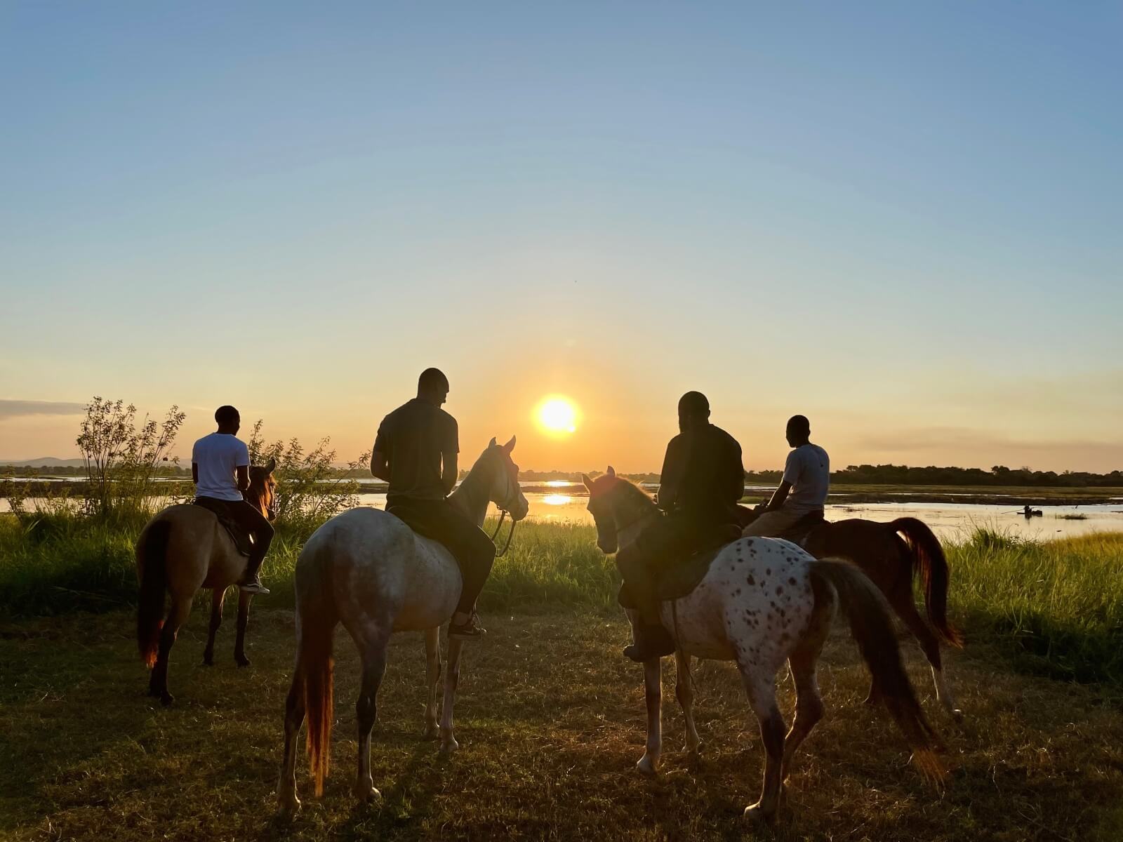 Horseback riding in Malawi: Kuti Wildlife Reserve during sunset Horseback riding in Malawi: Kuti Wildlife Reserve during sunset